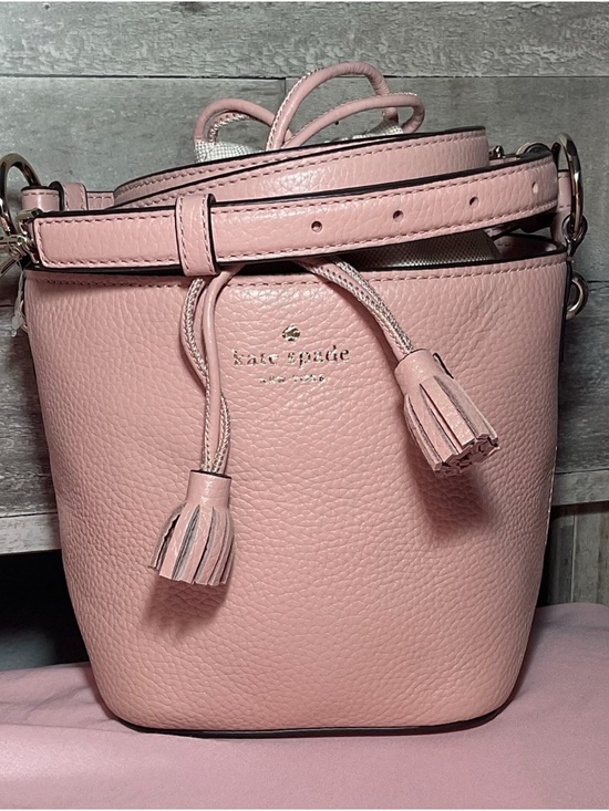 kate spade Handbags - kate spade Pink Pebbled Leather Tassel Drawstring Crossbody